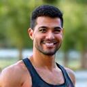 Professional headshot of David Chen, a certified fitness coach.
