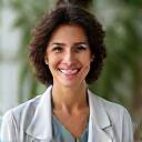 Professional headshot of Dr. Amelia Roth, a wellness expert.