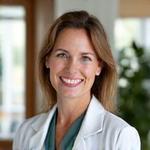 Portrait of Dr. Elara Vance, a warm, approachable female doctor in her late 40s or early 50s with kind eyes and a gentle smile, wearing professional attire in an open, plant-filled office.